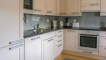 Fridge, microwave, dishwasher, high chair