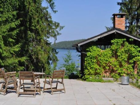 Outdoor dining. Villa vuorikotka by Interhome