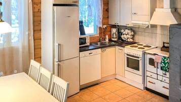 Fridge, microwave, cookware/dishes/utensils