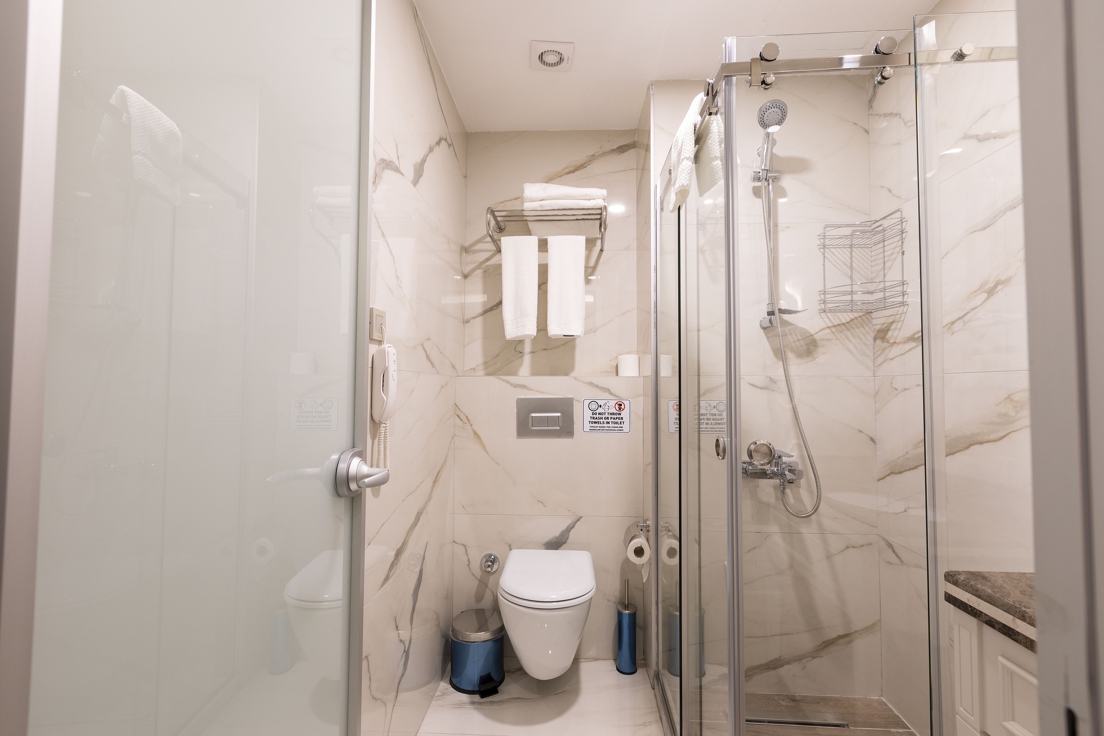 shower, rainfall showerhead, designer toiletries, hair dryer