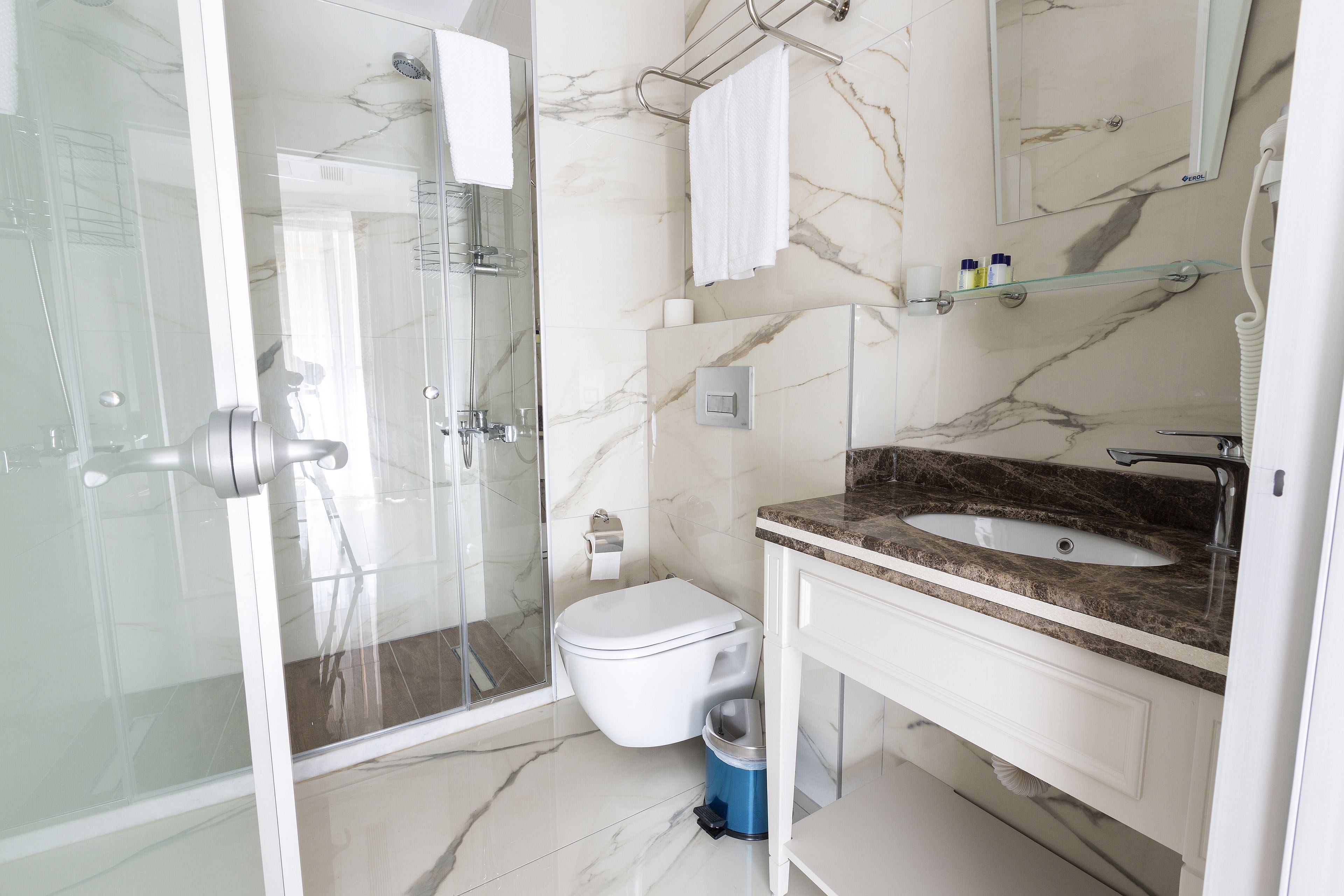 shower, rainfall showerhead, designer toiletries, hair dryer