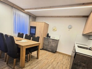 Fridge, dishwasher, cookware/dishes/utensils, dining tables - Ferienhaus Adonis by Interhome (Saas-Grund)