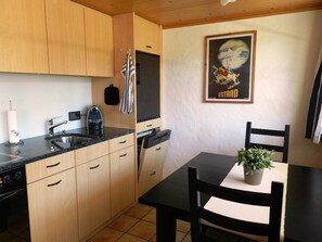 Fridge, dishwasher, cookware/dishes/utensils, dining tables