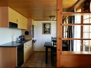 Fridge, dishwasher, cookware/dishes/utensils, dining tables - Bijou Arnensee by Interhome (Feutersoey)