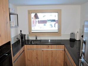 Fridge, dishwasher, cookware/dishes/utensils, dining tables