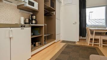 Fridge, microwave, cookware/dishes/utensils