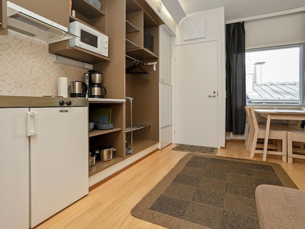 Fridge, microwave, cookware/dishes/utensils