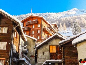 A wooden building with a sign indicating it is a restaurant. - Monte Rosa by Interhome (Saas-Grund)
