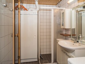 A bathroom with a shower, sink, and mirror. - Ylläs chalets a307 by Interhome (Ylläsjärvi)
