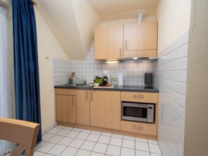 Fridge, microwave, toaster, high chair