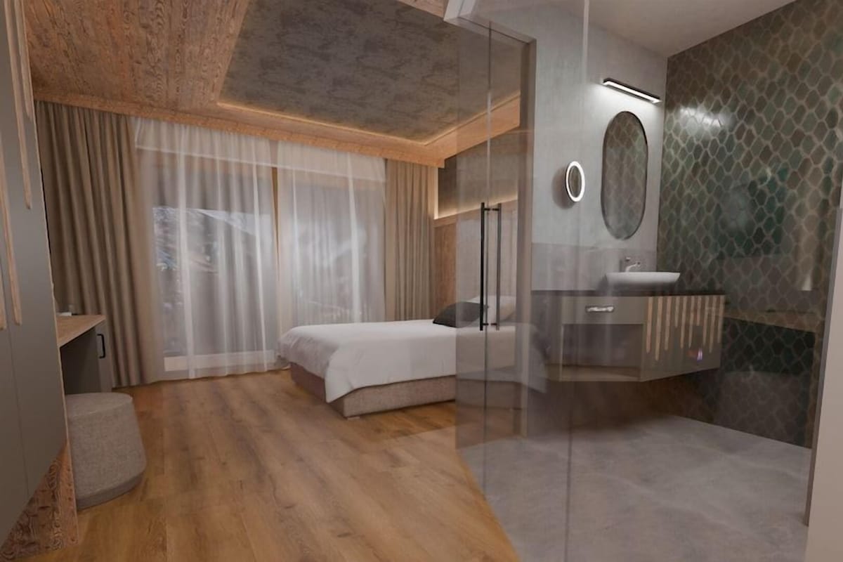 Luxe beddengoed, een minibar, een kluis op de kamer, een bureau