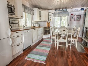 Fridge, microwave, dishwasher, cookware/dishes/utensils