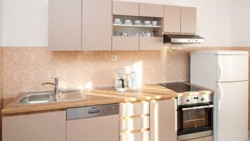 Réfrigérateur, four, lave-vaisselle