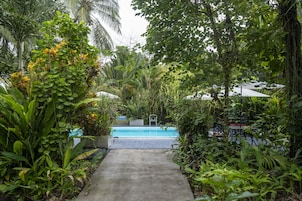 Outdoor pool, open 8:00 AM to 10:00 PM, sun loungers