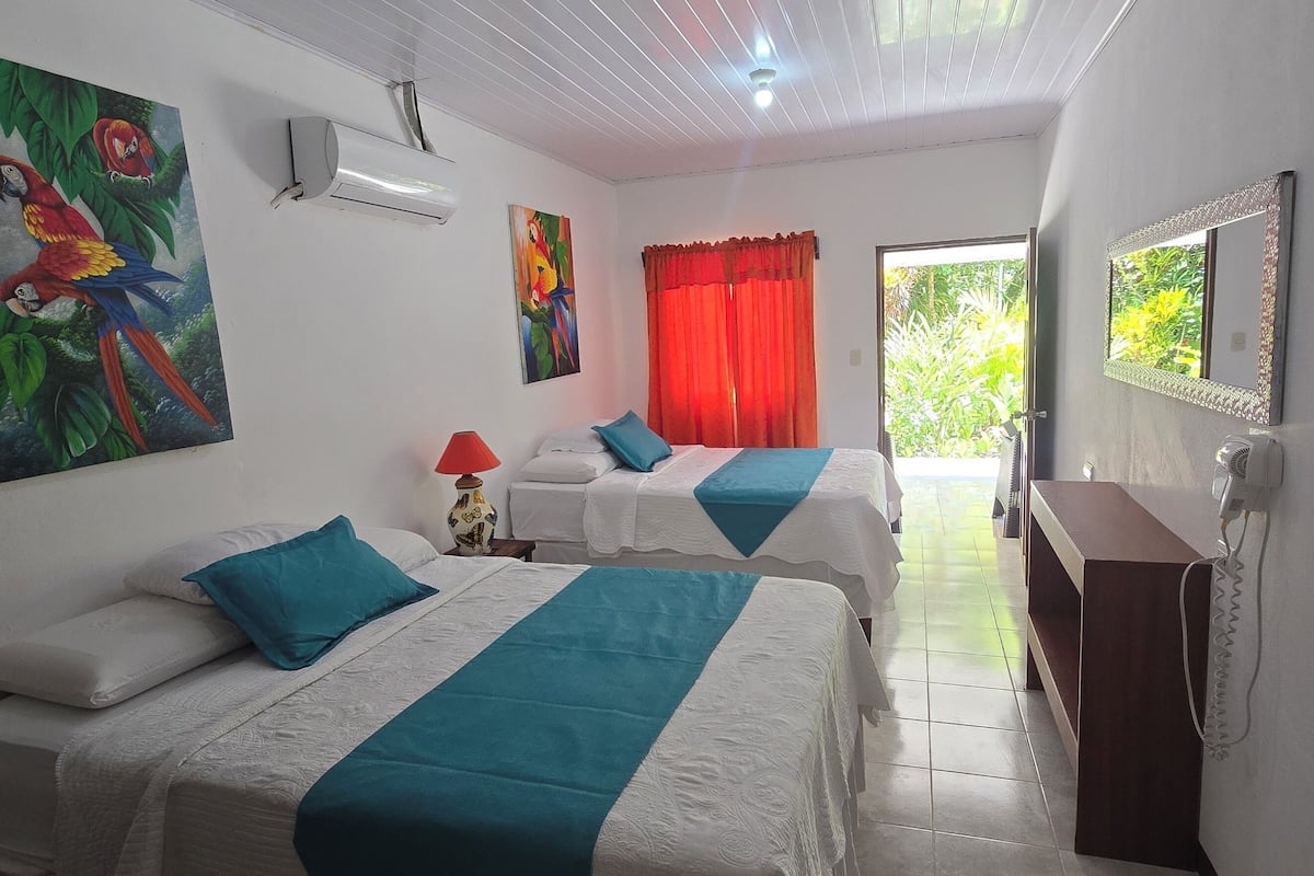 Triple Room, Multiple Beds, Garden View (With AC) | 1 bedroom, bed sheets