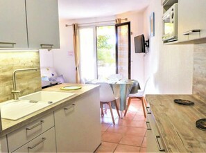 Fridge, microwave, oven, high chair