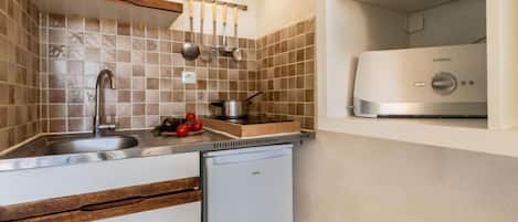 Fridge, microwave, high chair, cookware/dishes/utensils