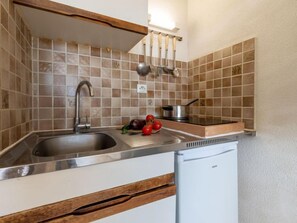 Fridge, microwave, high chair, cookware/dishes/utensils