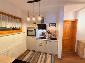 Fridge, microwave, oven, cookware/dishes/utensils