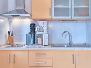 Fridge, microwave, cookware/dishes/utensils