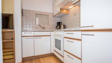 Fridge, microwave, oven, cookware/dishes/utensils