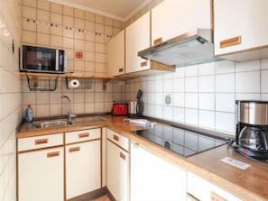 Fridge, microwave, cookware/dishes/utensils