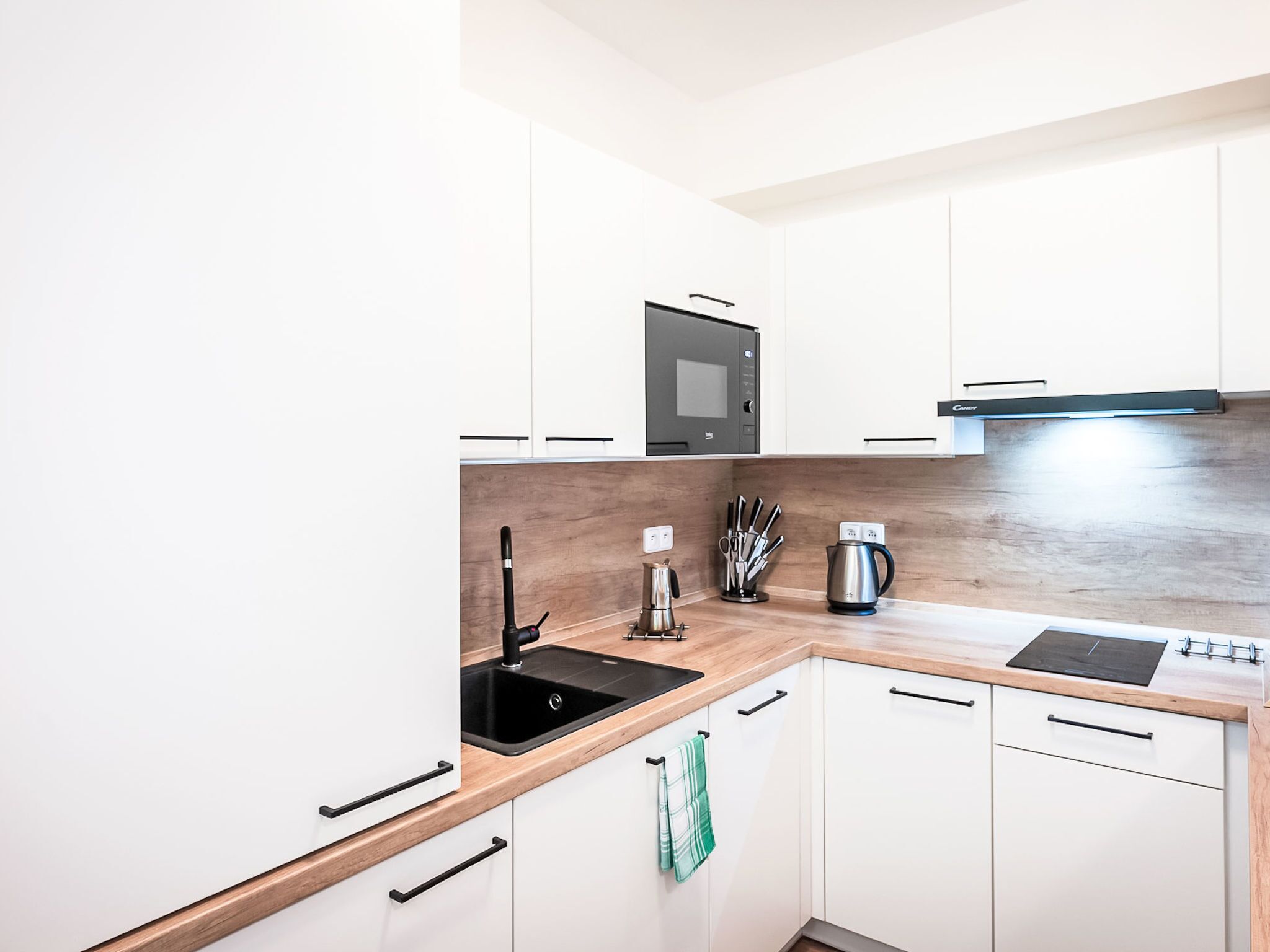 Fridge, microwave, cookware/dishes/utensils