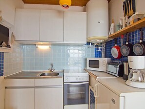 Fridge, microwave, oven, high chair