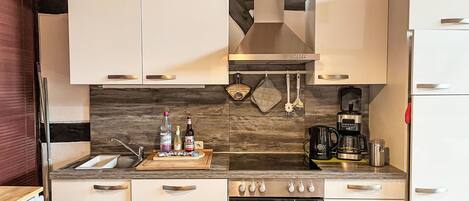 Fridge, oven, dishwasher, high chair