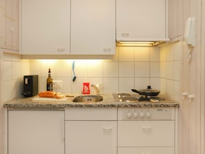 Fridge, cookware/dishes/utensils, dining tables - Suzanne Nr. 21 by Interhome (Schönried)