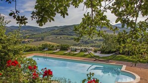A pool with a view of a vineyard and hills in the background. - Allerona by Interhome (Orvieto)