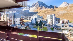 A modern building with a view of a mountainous landscape. - Le Curling A (Val Claret) by Interhome (Tignes)