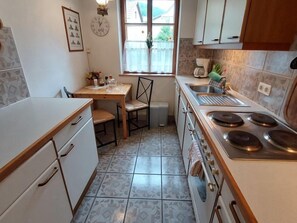 Fridge, oven, dishwasher, high chair