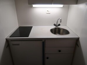 Fridge, microwave, cookware/dishes/utensils