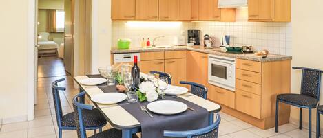 Fridge, dishwasher, cookware/dishes/utensils