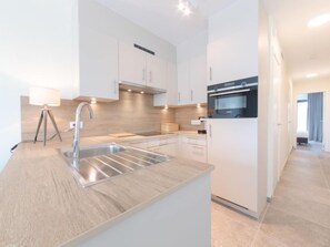 Fridge, microwave, dishwasher, high chair