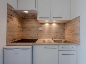 Fridge, microwave, cookware/dishes/utensils