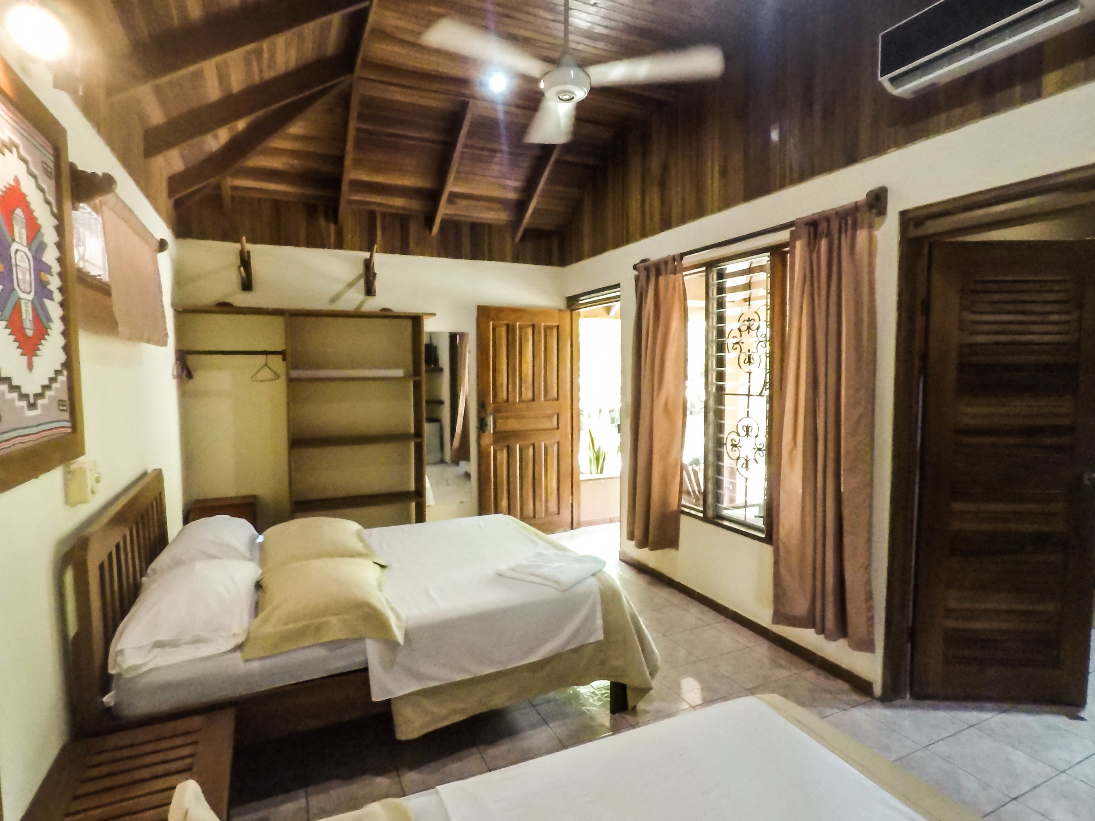 junior bungalow, multiple beds, pool access, garden view | 1 bedroom, in-room safe, free wifi, bed sheets