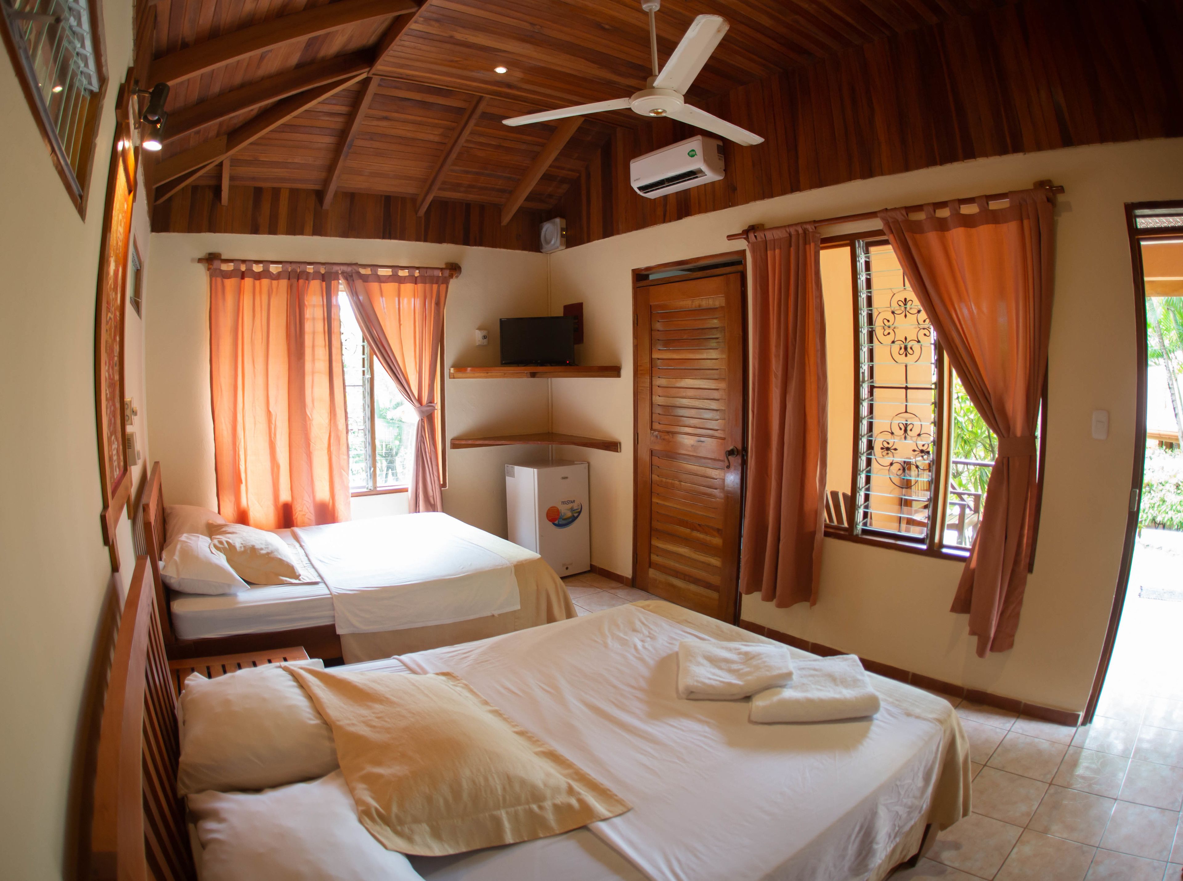 comfort bungalow, multiple beds, pool access, garden view | 1 bedroom, in-room safe, free wifi, bed sheets