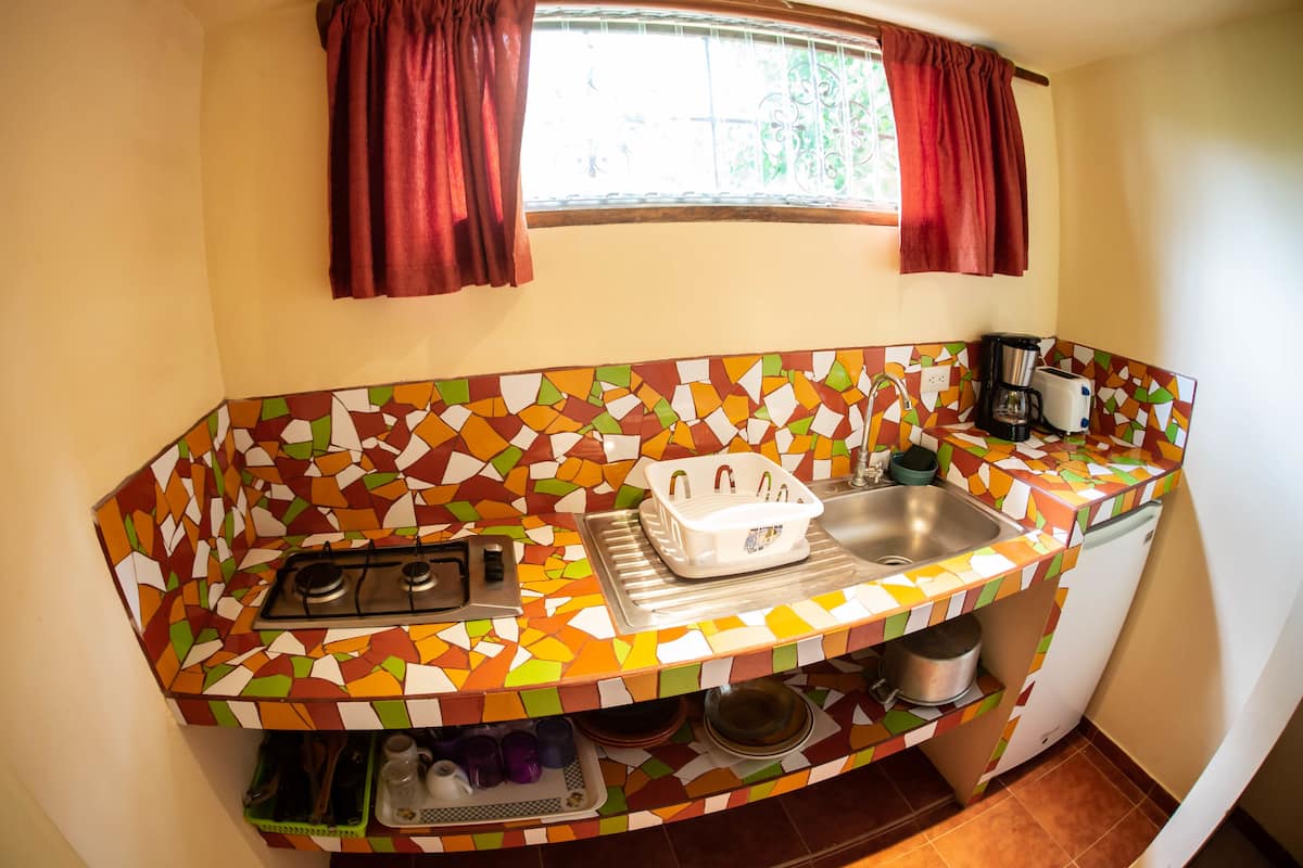 comfort bungalow, multiple beds, kitchenette, garden view | private kitchenette