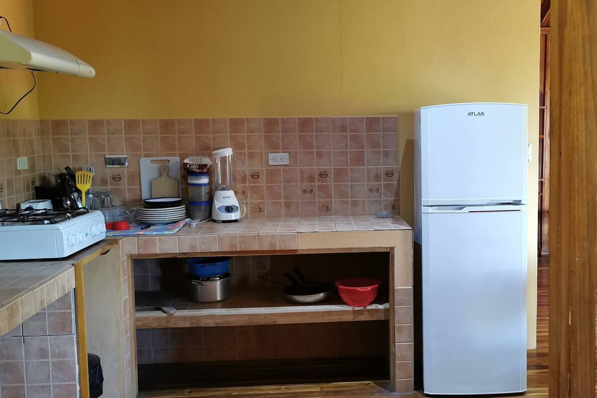 comfort studio, multiple beds, kitchen, pool view | private kitchen