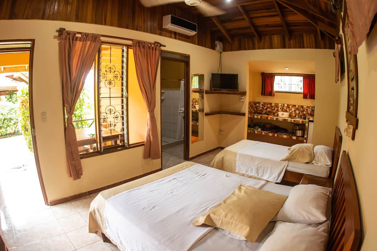 comfort bungalow, multiple beds, kitchenette, garden view | 1 bedroom, in-room safe, free wifi, bed sheets