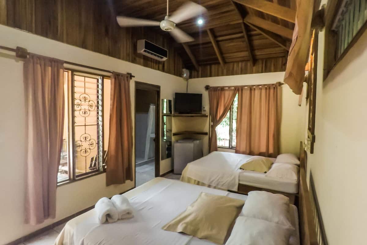 Comfort Cabin, 2 Double Beds, Pool Access, Garden View | In-room safe, WiFi (free), bed sheets