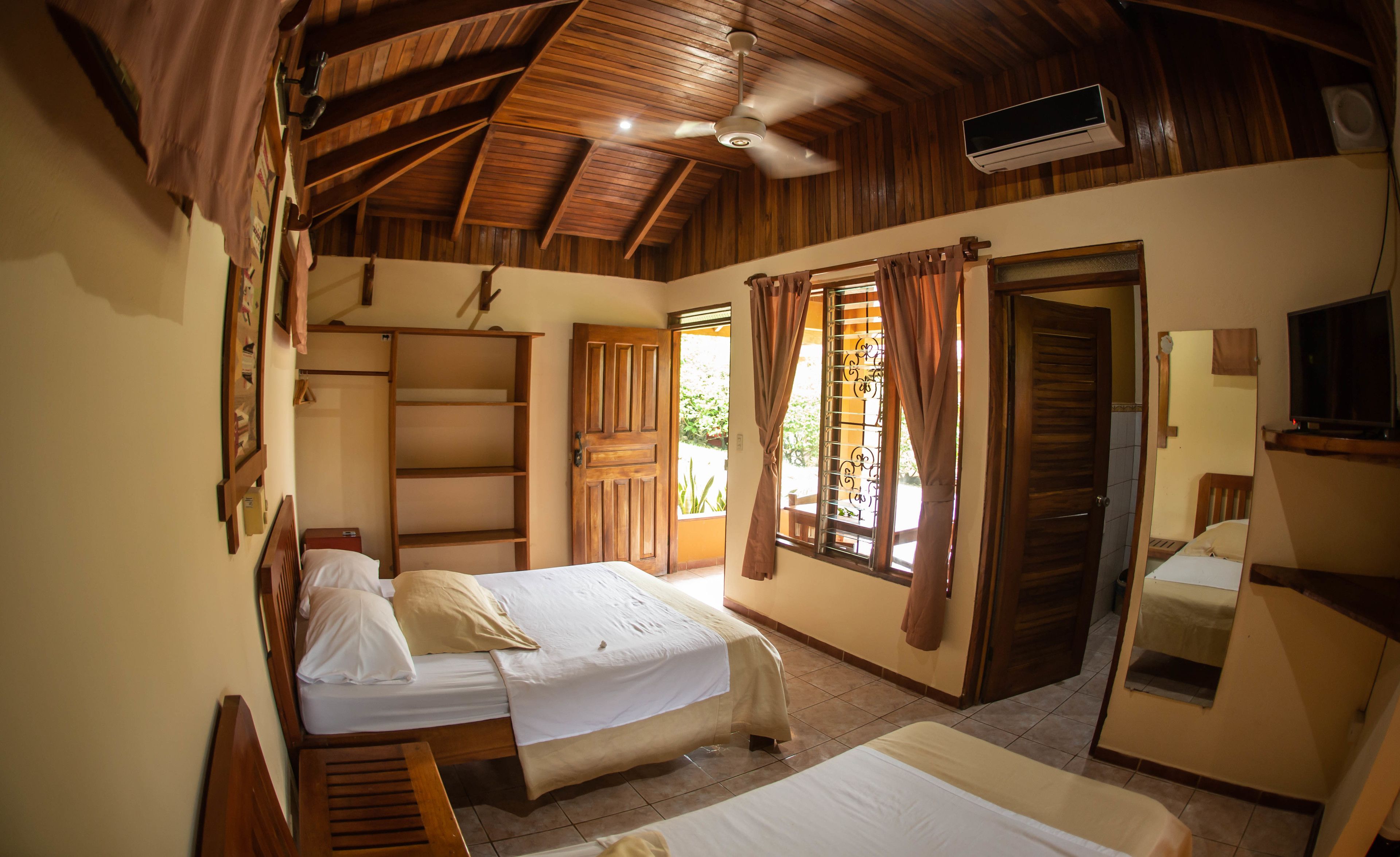 comfort bungalow, multiple beds, kitchenette, garden view | 1 bedroom, in-room safe, free wifi, bed sheets