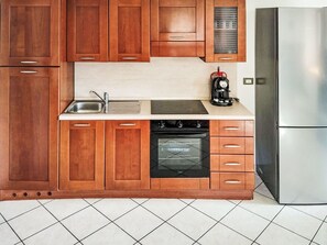 Fridge, oven, cookware/dishes/utensils, dining tables - Ville sur Sarre by Interhome (Sarre)
