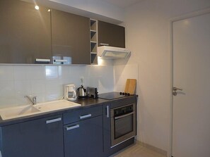 Fridge, microwave, cookware/dishes/utensils