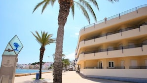 A beachfront building with balconies overlooking the sea. - Maritim II by Interhome (Llançà)