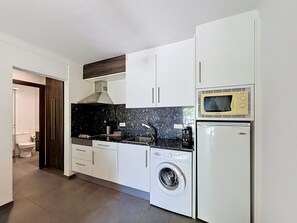 Fridge, microwave, cookware/dishes/utensils