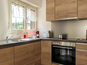 Fridge, oven, dishwasher, high chair