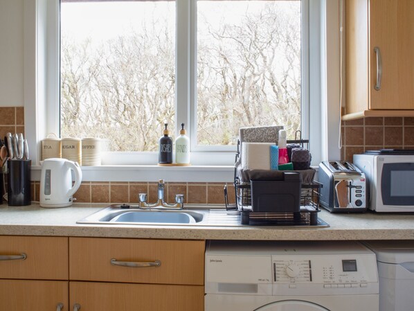 Fridge, microwave, oven, cookware/dishes/utensils